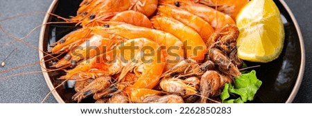 shrimps fresh prawns seafood plate healthy meal food snack on the table copy space food background rustic top view pescatarian diet Royalty-Free Stock Photo #2262850283