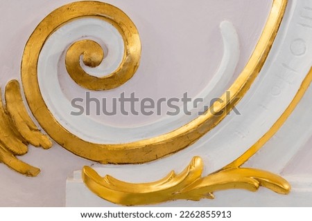 White gypsum bas-relief with gold colored details, wall design, rococo style, classic architecture abstract template Royalty-Free Stock Photo #2262855913