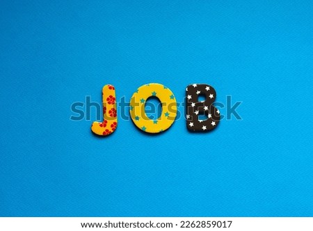 colored job on blue paper background