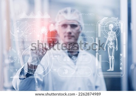 Medical doctor using advance technology big data visual display computer touch screen overlay in Science research Lab. Royalty-Free Stock Photo #2262874989