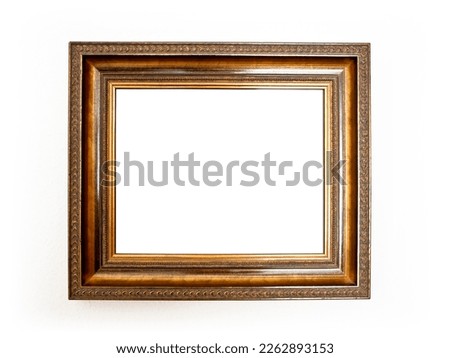 Beautiful golden picture frame, isolated, with free space for picture or text