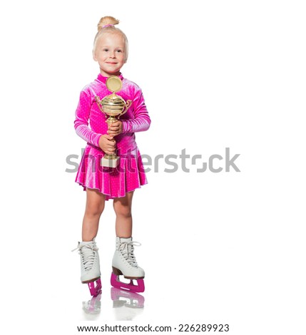Little beautiful girl portrait in skates on the ice