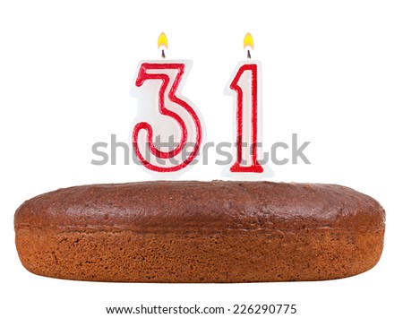 birthday cake with candles number 31 isolated on white background