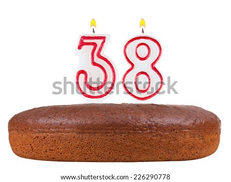 birthday cake with candles number 38 isolated on white background