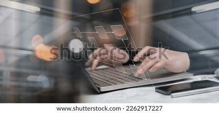 Programmer working on laptop with algorithm on blurred background.