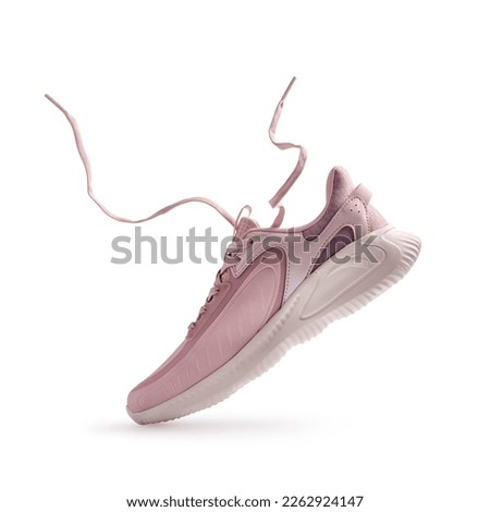 Sport shoes or sneakers for street style, running, jogging or gym with flying shoelaces isolated on white background Royalty-Free Stock Photo #2262924147