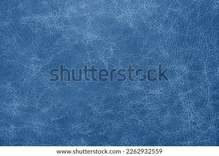 Genuine, natural, artificial blue leather texture background. Luxury material for header, banner, backdrop, wallpaper, clothes, furniture and interior design. ecological friendly leatherette.