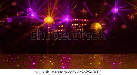 disco background with disco balls in purple and gold lighting Royalty-Free Stock Photo #2262948685