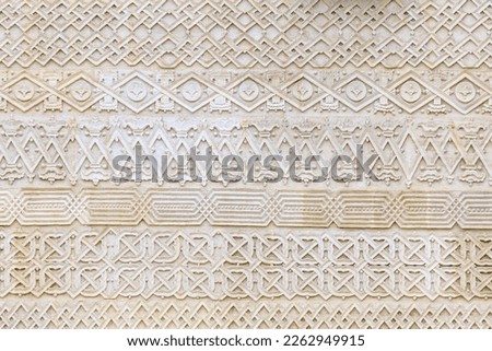 Rough texture wall surface with vintage patterns. Backdrop for design, graphic resource. Texture background.