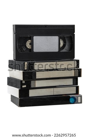 Pile of VHS video cassettes. Vintage media. Isolate on a white background. Royalty-Free Stock Photo #2262957265