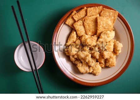 Side Dish for Dinner, Deep Fried Tempeh and Chicken Bite Royalty-Free Stock Photo #2262959227