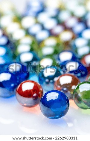 Colorful glass marbles close up shot