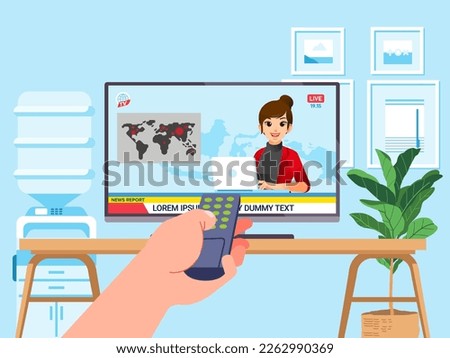 Remote control holding in hand watching TV to see the news about pandemic on living room Royalty-Free Stock Photo #2262990369