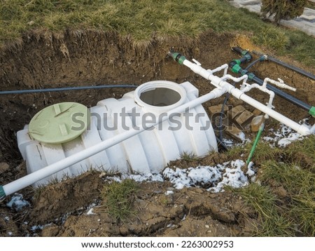 water collection tank for lawn irrigation Royalty-Free Stock Photo #2263002953
