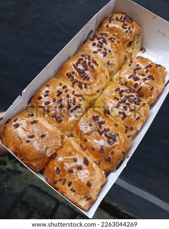 Photo of Bolen Pisang Bandung Or Bolen Banana From West Java - Indonesia, Famous Snacks Or Bread Pastry And It Is Made With Bananas, Chocolate, And Cheese.  