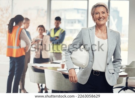 Portrait, construction worker and manager with an engineer woman at work in her architecture office. Industry, design and building with a female architect leader working on a development project Royalty-Free Stock Photo #2263058629