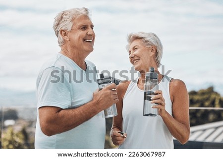 Senior couple, fitness and water bottle with smile for hydration or thirst after workout, exercise or training in nature. Happy elderly man and woman smiling for natural refreshment from exercising Royalty-Free Stock Photo #2263067987