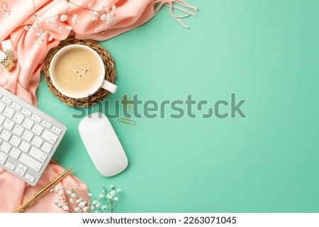 Top view photo of keyboard computer mouse cup of frothy coffee on rattan serving mat golden pen clips adhesive tape gypsophila flowers and pink scarf on isolated turquoise background with copyspace
