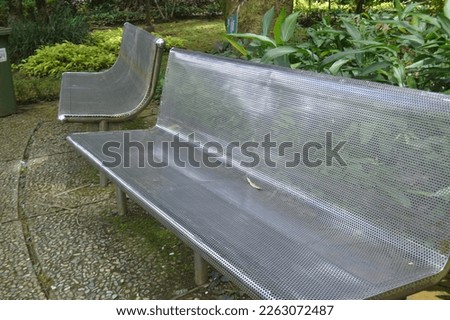 selective focus, garden chair background made of stainless material, chairs for visitors to rest