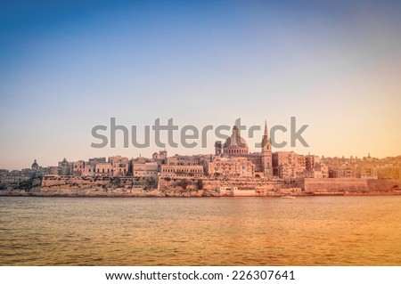 La Valletta at sunset from the sea - Capital of world famous mediterranean island of Malta 