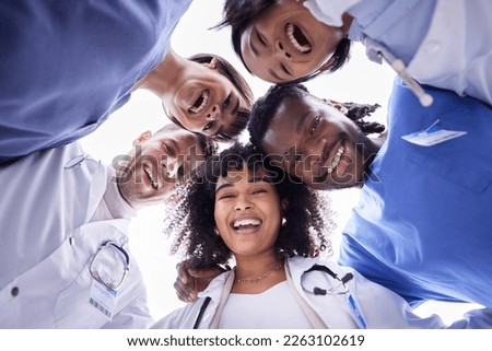 Doctor, group portrait and below circle for motivation, support and collaboration with smile, solidarity and diversity. Friends, doctors and face with teamwork, goals and help in healthcare at clinic Royalty-Free Stock Photo #2263102619