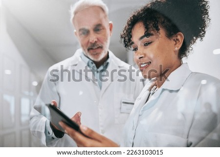 Doctors, tablet and clinic, health team and communication, digital medical document or test results. Partnership, window and senior man with black woman, conversation and technology in healthcare