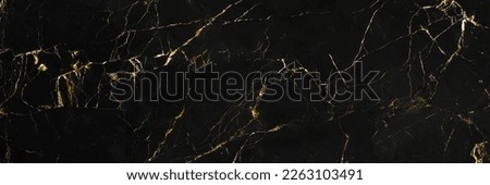 black marble background with yellow veins. Gold Patterned natural of black marbel (Gold Russia) texture for product design, Can also be used for create surface effect to architectural slab marbl.