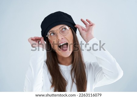 Isolated picture of brunette woman on white background wearing glasses