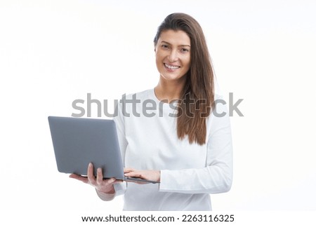 Isolated picture of brunette woman on white background with computer
