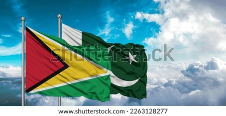 Flags of Pakistan and Guyana friendship flag waving on the sky with beautiful Sky light