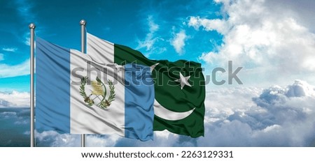 Flags of Pakistan and Guatemala friendship flag waving on the sky with beautiful Sky light
