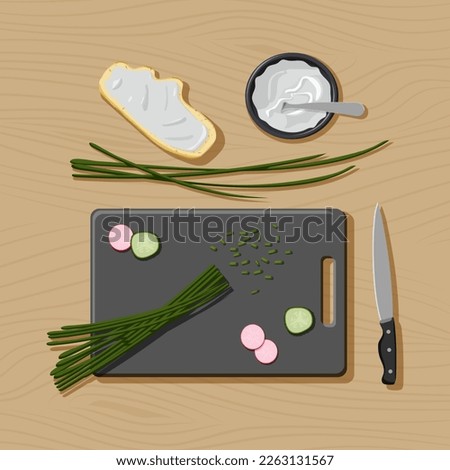 Flat lay with ingredients for healthy vegetarian sandwich on wooden background. Cutting board, kitchen knife, slices of cucumber and radish, scalion and bread with cream cheese. Top view concept Royalty-Free Stock Photo #2263131567