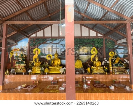 Prepare the seat for the Buddha image for giving alms to monks on Buddhist holy days.