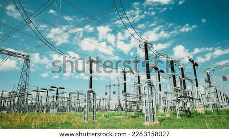 Power Grid Station. Electrical Distribution Station, Transformers, High-voltage Lines In Sunny Summer Day. , . Royalty-Free Stock Photo #2263158027