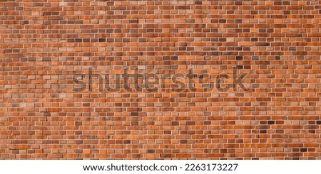 Old dirty red brick wall background, wide panorama. Brick wall, masonry, stonework.
