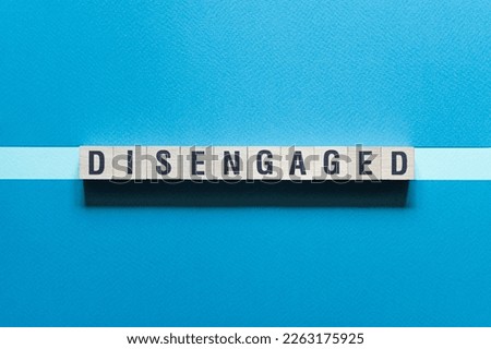Disengaged - word concept on cubes, text, letters Royalty-Free Stock Photo #2263175925