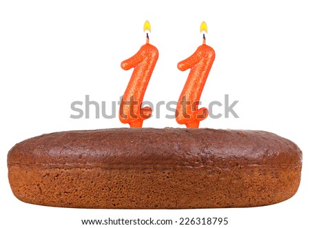 birthday cake with candles number 11 isolated on white background