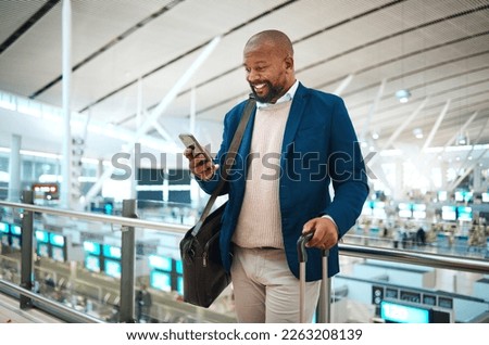 Black man with phone, airport and online check in or flight schedule in terminal for business trip. Smile, travel and happy businessman checking visa or international destination time on mobile app.