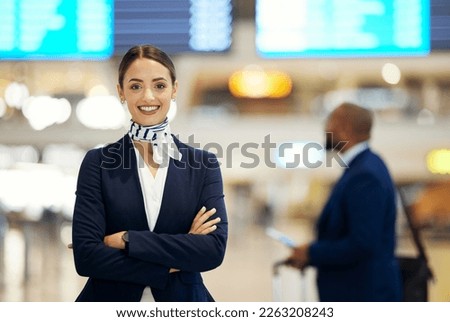 Woman, airport and service agent with arms crossed standing ready with smile in FAQ, help or direction. Portrait of happy female airline passenger assistant smiling for immigration or travel services Royalty-Free Stock Photo #2263208243