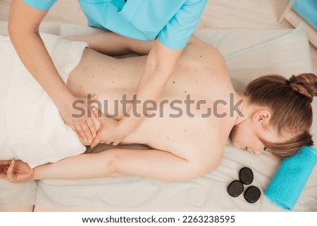 back massage in the office crepatura osteopathy relaxation stones