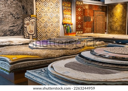 Shop, sale of carpets of different plans and colors. High quality photo