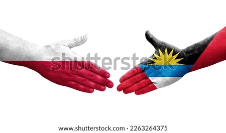 Handshake between Antigua and Barbuda and Poland flags painted on hands, isolated transparent image.