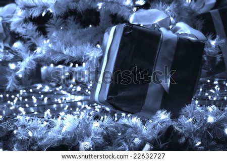 Christmas tree with present in blue color