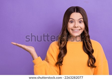 Photo of charming cute lady wear trendy clothes arm presenting empty space black friday discounts isolated on purple color background Royalty-Free Stock Photo #2263282077