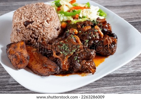 A view of a plate of braised oxtail. Royalty-Free Stock Photo #2263286009