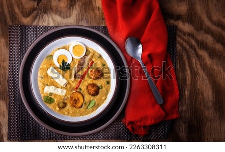 Top view of a fanesca plate. Traditional Ecuadorian food eaten at Easter Royalty-Free Stock Photo #2263308311