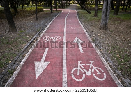 Bicycle sign on a red bike path in Podgorica, Montenegro.