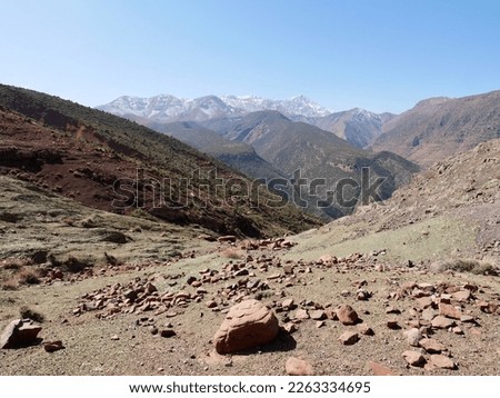 Panoramic view of snow-capped High Atlas Mountains in Ourika valley, Morocco. High quality photo