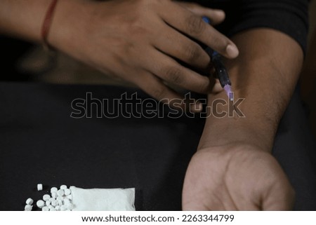 addict man with syringe using drugs injection Royalty-Free Stock Photo #2263344799