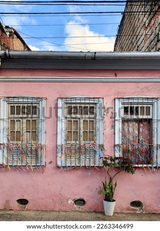 Pink house wall during carnaval in Salvador, Brazil